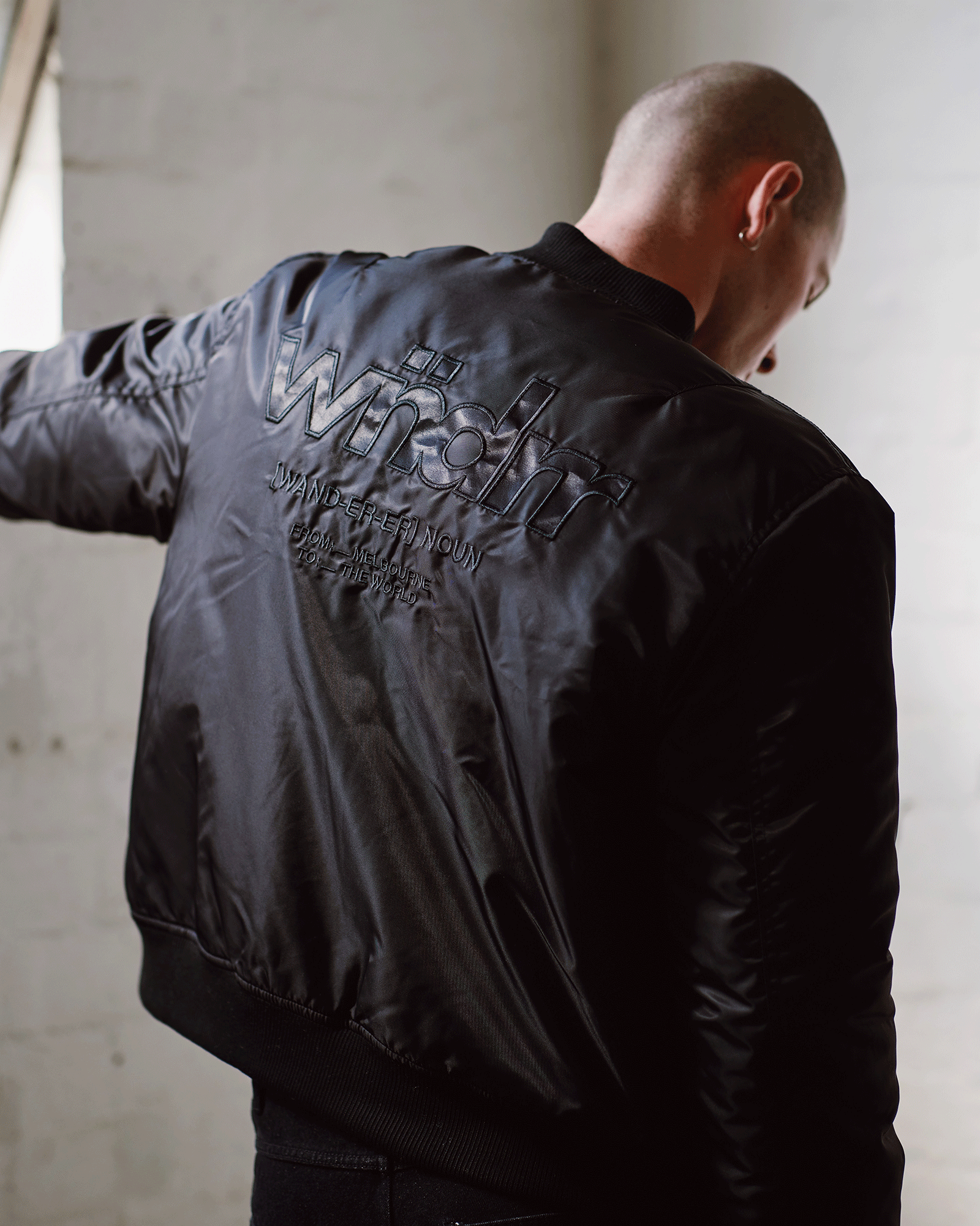 THE WORLD BOMBER JACKET - BLACK